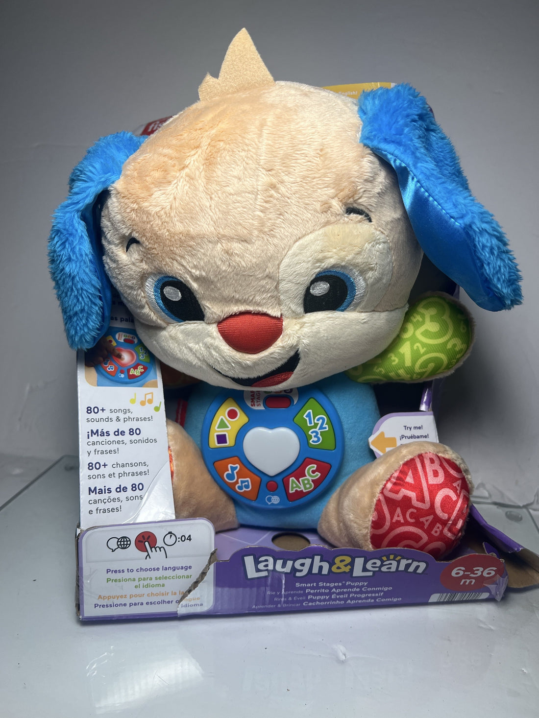 Fisher-Price Baby Learning Toy Laugh & Learn Smart Stages Puppy Musical Plush with Smart Stages for Infants Ages 6+ Months, Multilanguage Version