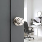 Kwikset Cove Satin Nickel Exterior Keyed Entry Door Knob ft. SmartKey Security