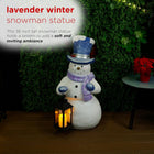 Alpine Corporation SKY562HH-S-TM Lavender Winter Snowman Holding Lantern Statue with Flashing Warm White LED Candle, 14” Tall, Indoor/Outdoor Holiday Decoration