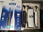 Oral-B iO Series 2 Rechargeable Electric Powered Toothbrush Twin Pack, Black and White - Automatic Pressure Sensor to Protect Gums - 3 Modes - 2 Min Timer