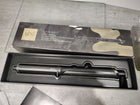 ghd Classic Wave Hair Curling Wand ― 1\ - 1.5\ Oval Ceramic-Coated Barrel with Safer-for-Hair Styling Tool Temperature, Achieve Beach Body Hollywood Waves to Undone Texture with All Day Hold ― Black