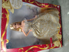 Barbie Signature 2025 Holiday Barbie Fashion Doll with Blonde Hair Wearing Silver & Gold Gown, Seasonal Collectible Includes Displayable Packaging & Doll Stand