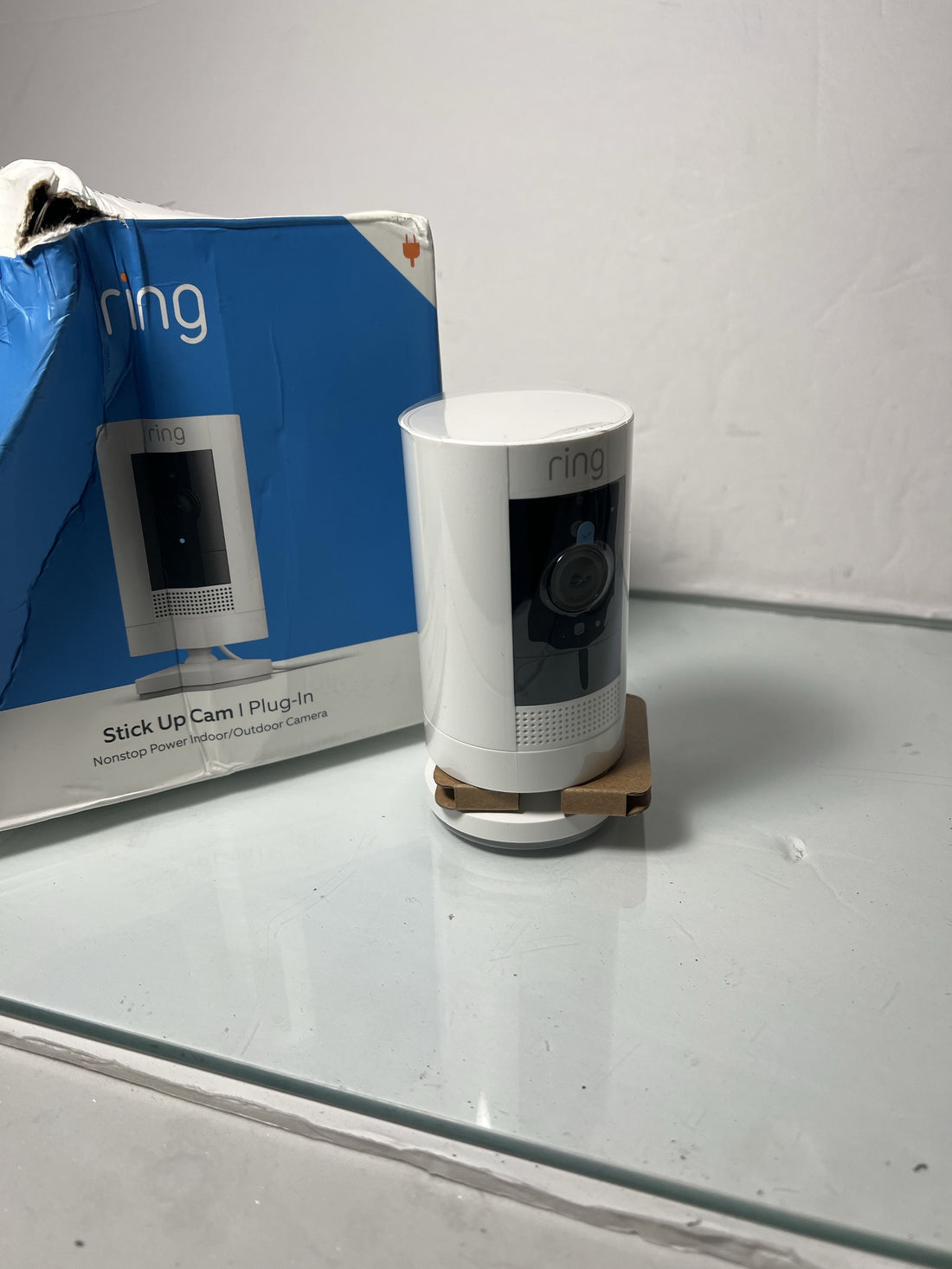 Ring Stick Up Cam Plug-In – HD security camera with two-way talk, Works with Alexa – White