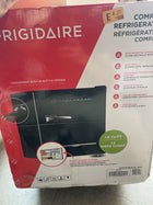 side damage FRIGIDAIRE Black Retro Mini Refrigerator-Energy Saving-Adjustable Thermostat Control-Side Mounted Bottle Opener-Ideal for Dorm, Office, RV, Garage, Apartment 1.6 Cubic Feet